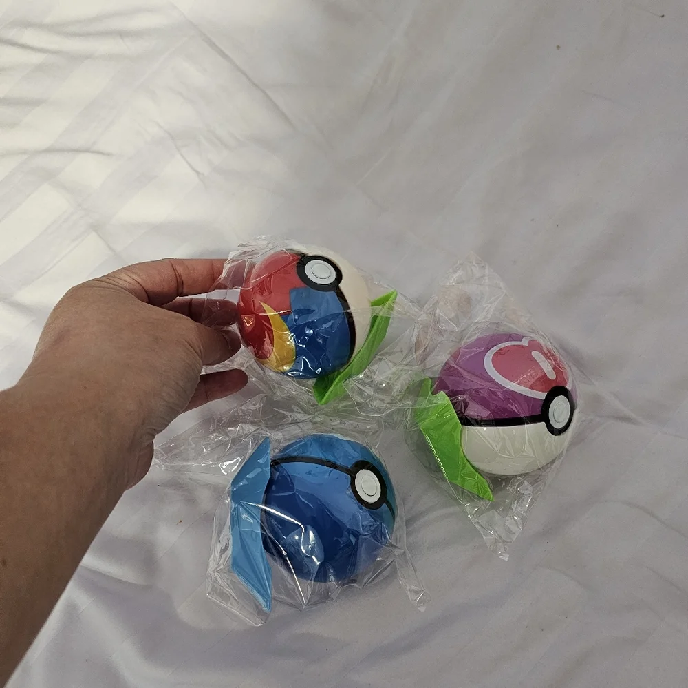 Three Pokeballs with mystery surprise character toy inside - Picture 1 of 1